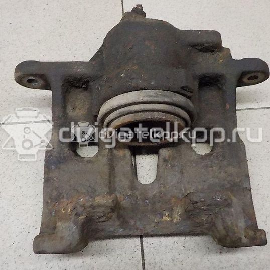 Фото Суппорт тормозной передний правый  701615124DX для Volkswagen Transporter