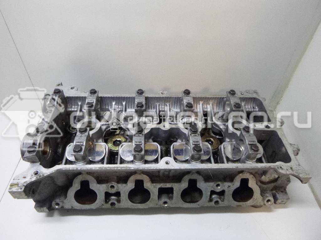 Фото Головка блока для двигателя B6 (DOHC) для Mazda Xedos / 323 107-109 л.с 16V 1.6 л бензин ZJ201001X {forloop.counter}}