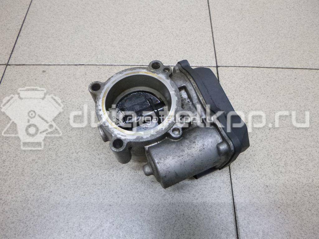 Фото Заслонка дроссельная электрическая  03C133062S для Volkswagen Scirocco / Tiguan / Eos 1F7, 1F8 / Golf / Passat {forloop.counter}}