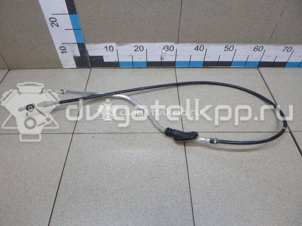 Фото Трос стояночного тормоза  6R0609721C для Volkswagen Polo {forloop.counter}}