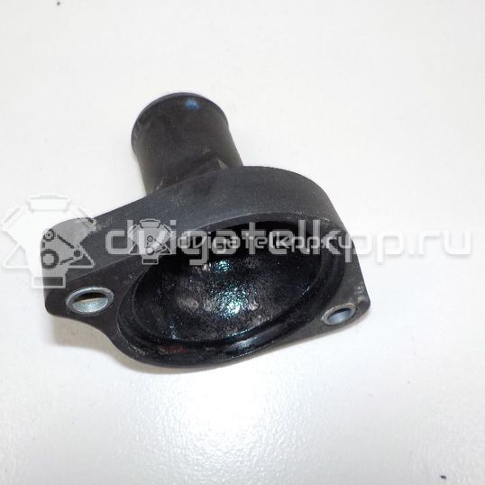 Фото Крышка термостата для двигателя 1KR-FE для Subaru / Toyota / Daihatsu 68-70 л.с 12V 1.0 л бензин 163210Q010