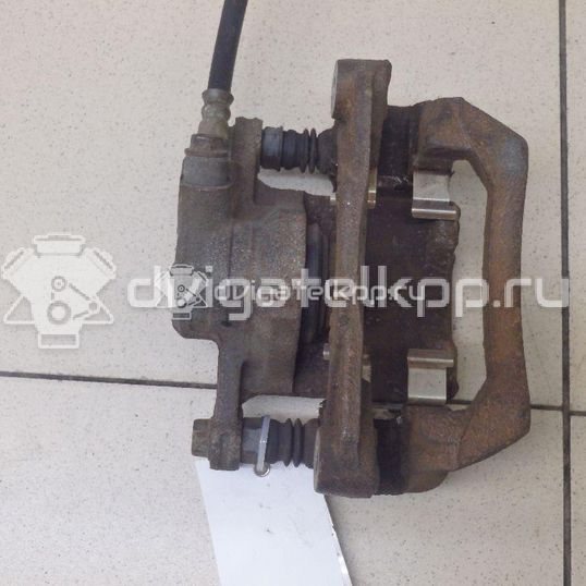 Фото Суппорт тормозной задний левый  26692FG010 для Subaru Forester / Impreza / Wrx Gj