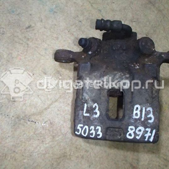 Фото Суппорт тормозной задний левый  26692AG030 для Subaru Legacy / Outback