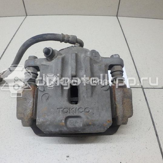 Фото Суппорт тормозной задний левый  26692AG071 для Subaru Legacy / Outback