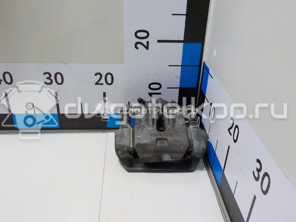 Фото Суппорт тормозной задний левый  26692AG070 для Subaru Legacy / Outback {forloop.counter}}