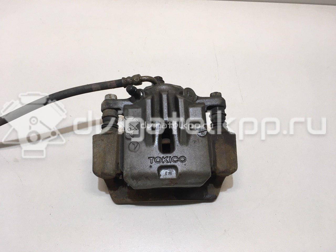 Фото Суппорт тормозной задний левый  26692AJ010 для Subaru Legacy / Outback {forloop.counter}}