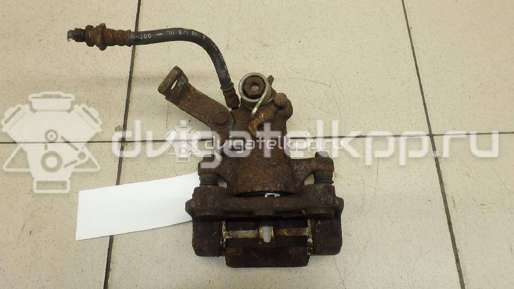 Фото Суппорт тормозной задний правый  5540180J00999 для Suzuki Sx4 / Swift {forloop.counter}}