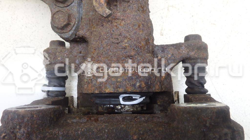 Фото Суппорт тормозной задний правый  5540180J00999 для Suzuki Sx4 / Swift {forloop.counter}}