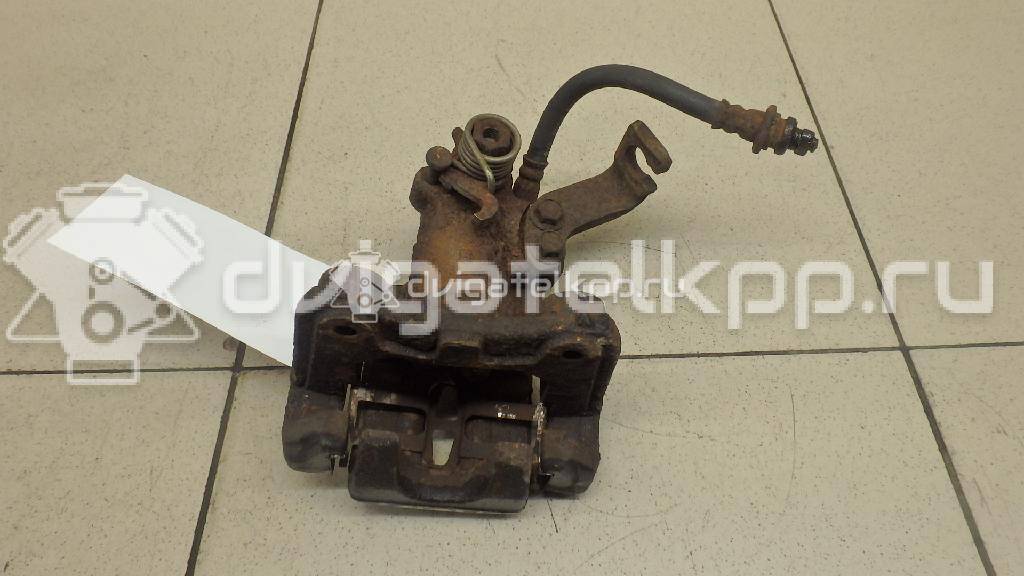 Фото Суппорт тормозной задний левый  5540280J00999 для Suzuki Sx4 / Swift {forloop.counter}}