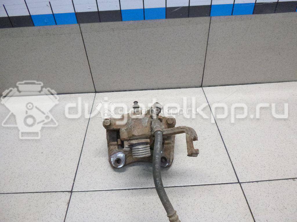 Фото Суппорт тормозной задний левый  5540280J00999 для Suzuki Sx4 / Swift {forloop.counter}}