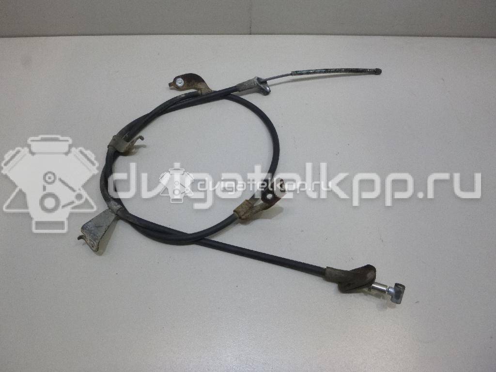 Фото Трос стояночного тормоза левый  5440268l02 для Suzuki Swift {forloop.counter}}