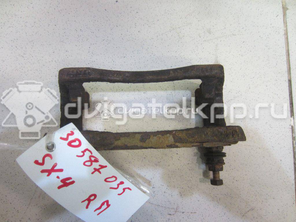 Фото Скоба суппорта переднего  5586079j00 для Suzuki Splash Ex / Sx4 / Swift {forloop.counter}}