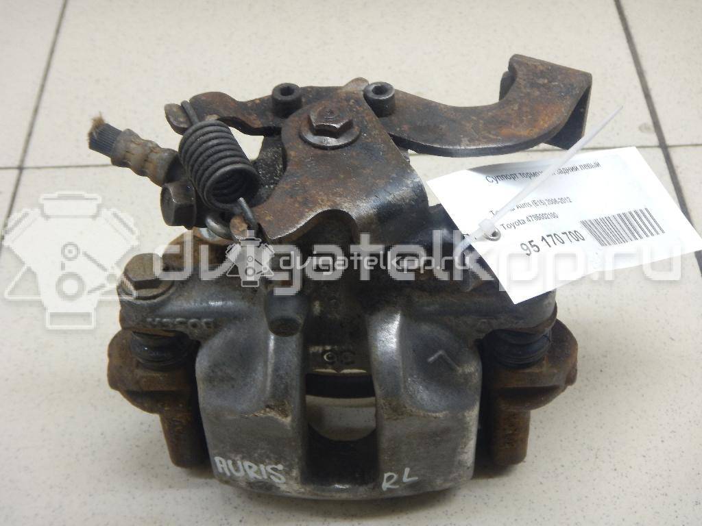 Фото Суппорт тормозной задний левый  4785002100 для Toyota Corolla / Auris {forloop.counter}}