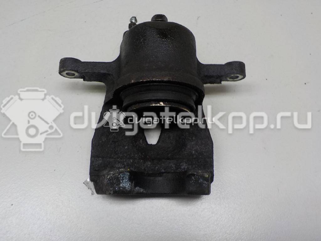Фото Суппорт тормозной передний левый  47750-52211 для Toyota Yaris {forloop.counter}}