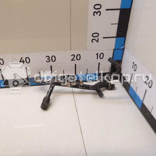 Фото Трубка охлажд. жидкости металлическая  06B121065AA для Audi A4