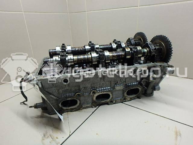 Фото Головка блока для двигателя B6 (DOHC) для Mazda Xedos / 323 107-109 л.с 16V 1.6 л бензин {forloop.counter}}