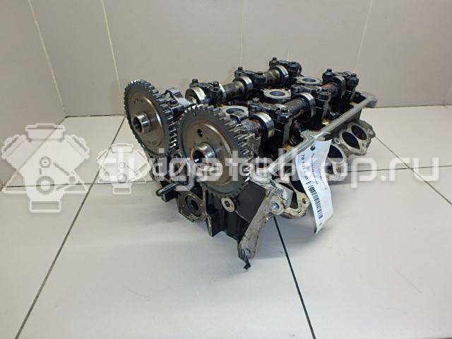 Фото Головка блока для двигателя B6 (DOHC) для Mazda Xedos / 323 107-109 л.с 16V 1.6 л бензин {forloop.counter}}