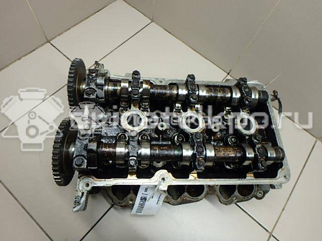 Фото Головка блока для двигателя B6 (DOHC) для Mazda Xedos / 323 107-109 л.с 16V 1.6 л бензин {forloop.counter}}