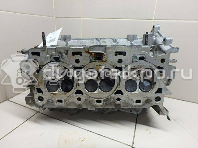 Фото Головка блока для двигателя B6 (DOHC) для Mazda Xedos / 323 107-109 л.с 16V 1.6 л бензин {forloop.counter}}