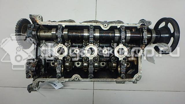 Фото Головка блока для двигателя B6 (DOHC) для Mazda Xedos / 323 107-109 л.с 16V 1.6 л бензин {forloop.counter}}