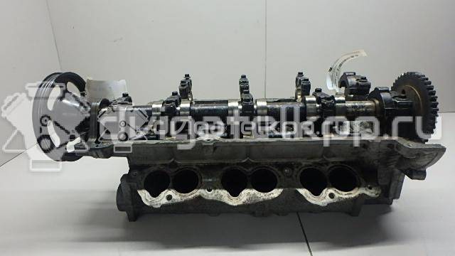 Фото Головка блока для двигателя B6 (DOHC) для Mazda Xedos / 323 107-109 л.с 16V 1.6 л бензин {forloop.counter}}