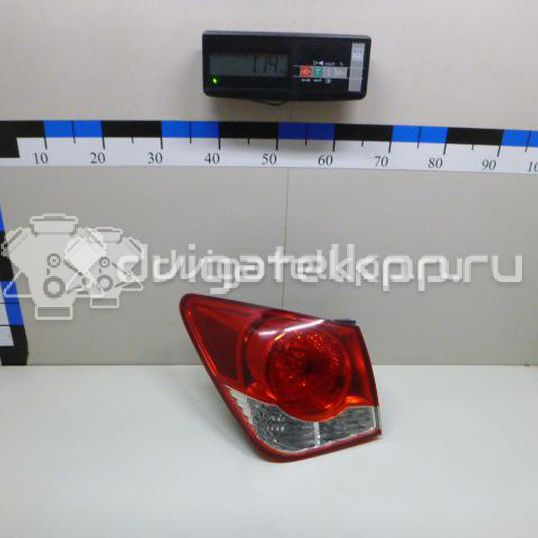 Фото Фонарь задний наружный левый  95965223 для Chevrolet Cruze