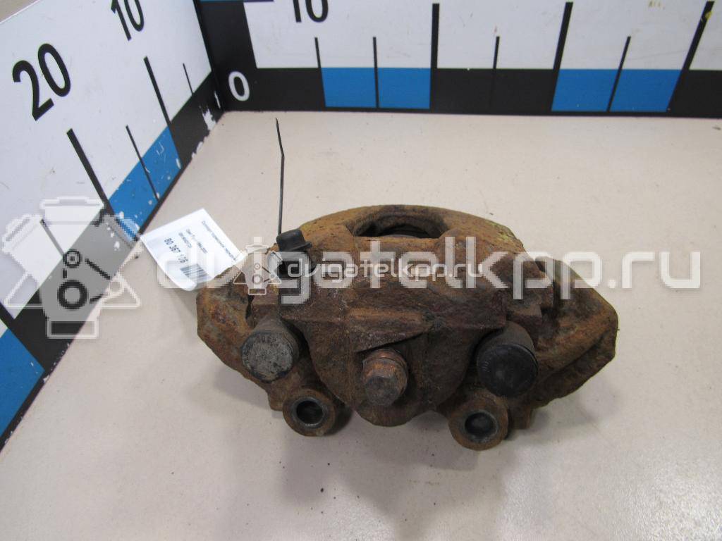 Фото Суппорт тормозной передний левый  90421729 для chevrolet Lanos {forloop.counter}}