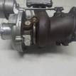Фото Турбокомпрессор (турбина) для двигателя UNCE для Ford Mondeo 160 л.с 16V 1.5 л бензин 1946977 {forloop.counter}}