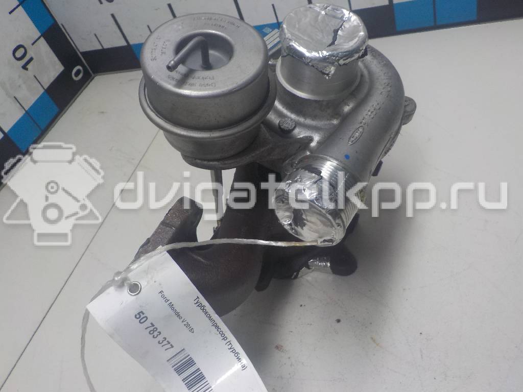 Фото Турбокомпрессор (турбина) для двигателя UNCE для Ford Mondeo 160 л.с 16V 1.5 л бензин 1946977 {forloop.counter}}