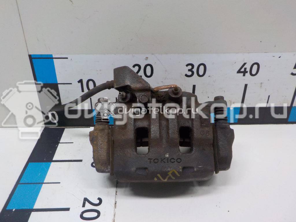 Фото Суппорт тормозной передний левый  MR977362 для Mitsubishi L {forloop.counter}}