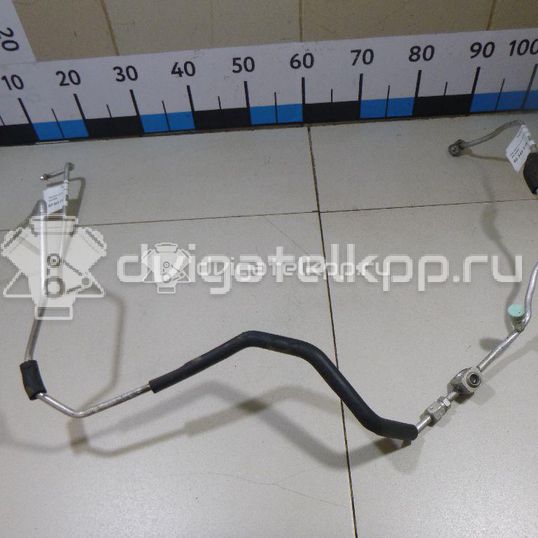 Фото Трубка кондиционера  MN124693 для mitsubishi Lancer (CS/Classic)