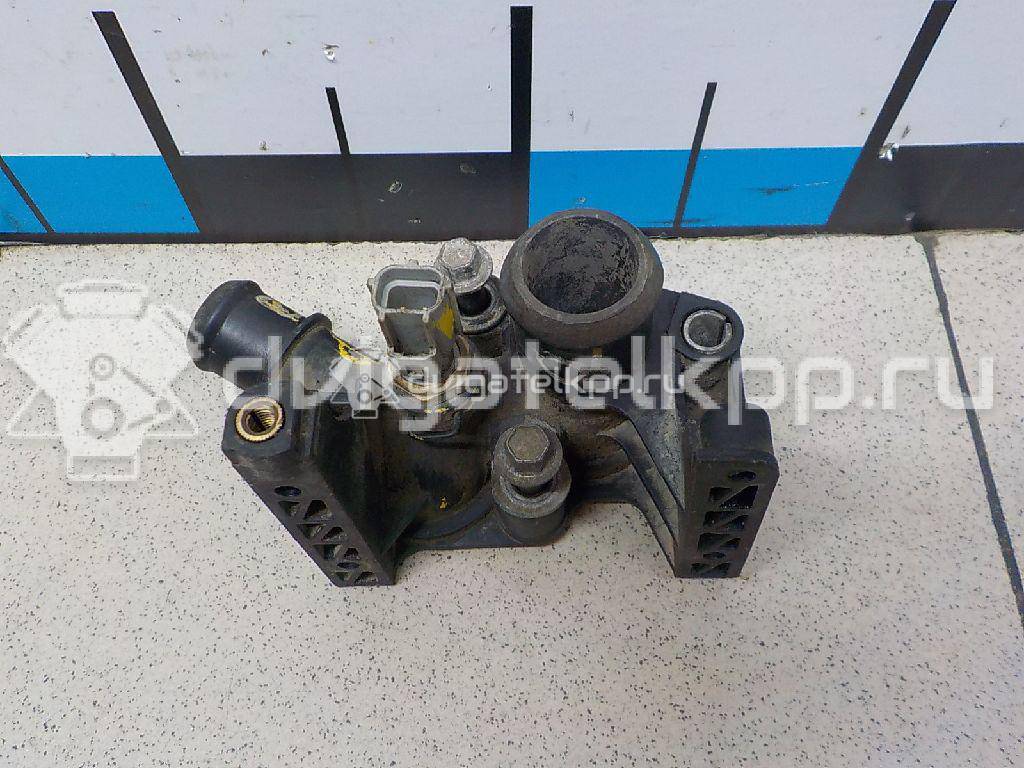 Фото Фланец двигателя системы охлаждения  1531004 для Ford Fiesta / Focus / Puma Ec / Fusion Ju {forloop.counter}}