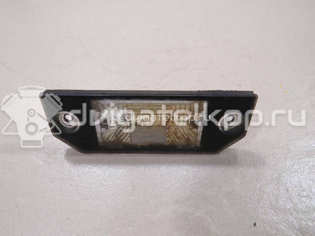 Фото Фонарь подсветки номера  4502331 для Ford Focus / C-Max {forloop.counter}}