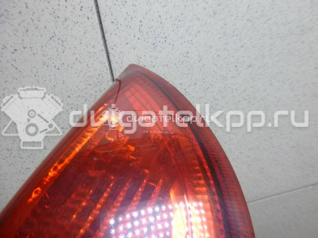 Фото Фонарь задний левый  1420451 для Ford Focus {forloop.counter}}