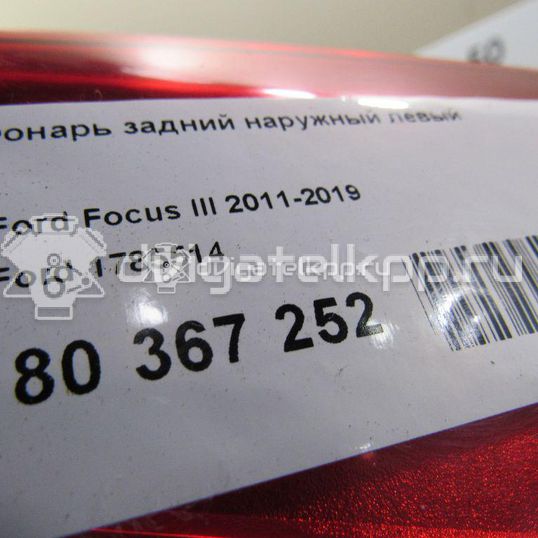 Фото Фонарь задний наружный левый  1785514 для Ford Focus