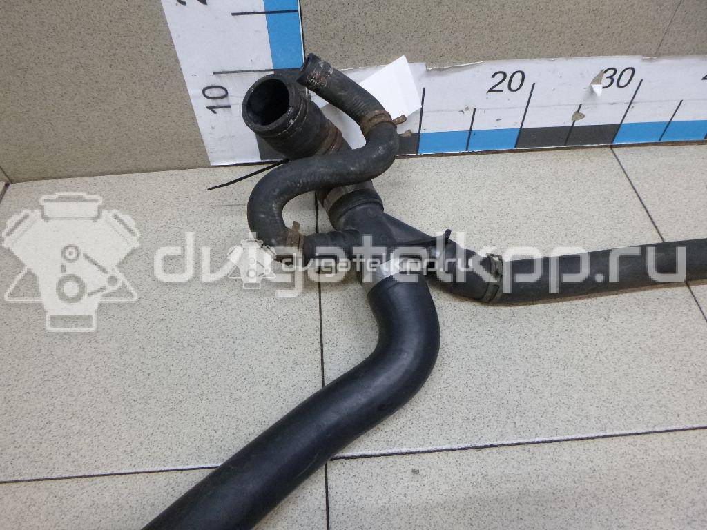 Фото Патрубок радиатора  1469442 для Ford Transit {forloop.counter}}