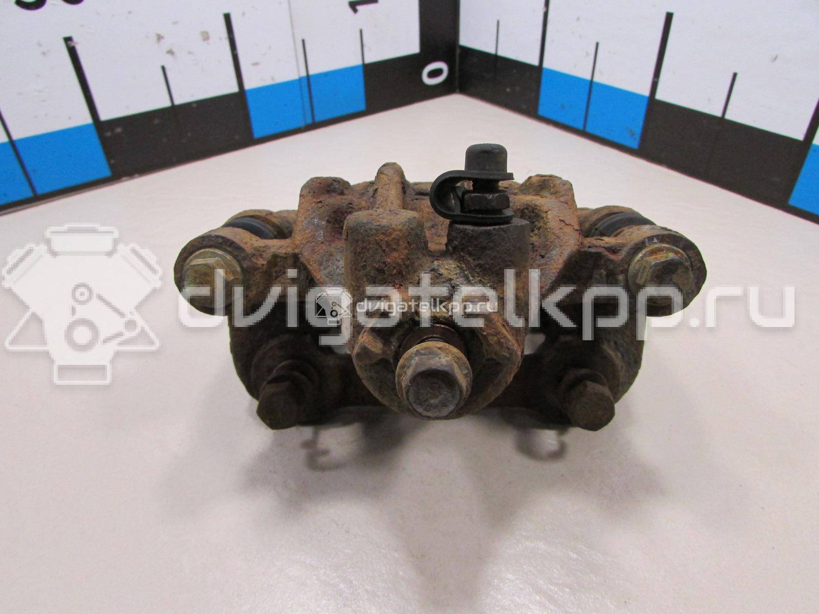 Фото Суппорт тормозной задний левый  582101H300 для Hyundai I30 {forloop.counter}}