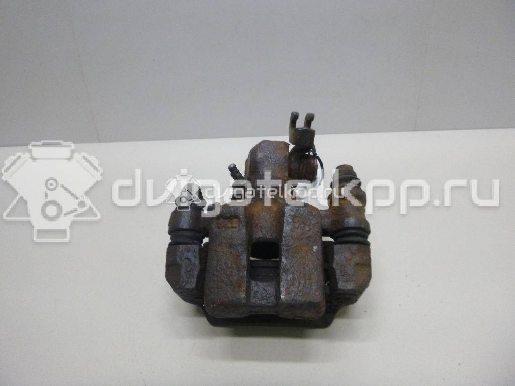 Фото Суппорт тормозной задний левый  0K2N349990 для Kia Shuma Fb / Carens / Sephia Fa / Clarus {forloop.counter}}