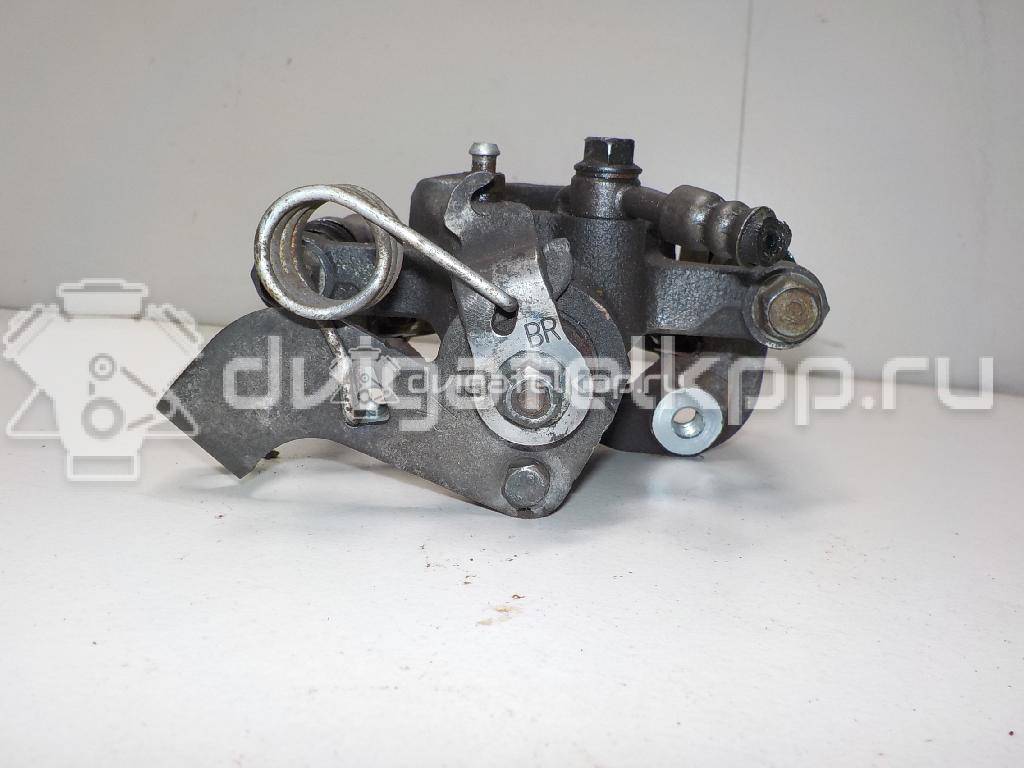 Фото Суппорт тормозной задний правый  584001W350 для Kia Rio {forloop.counter}}