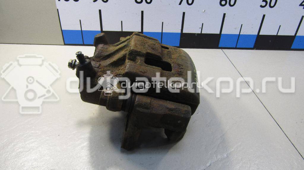 Фото Суппорт тормозной передний правый  L20633980A для Mazda Cx-7 Er / Cx-9 Tb {forloop.counter}}