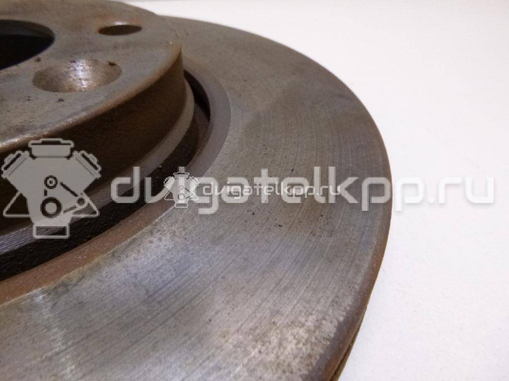 Фото Диск тормозной передний вентилируемый  40206AX600 для Nissan Note / Tiida / Micra {forloop.counter}}