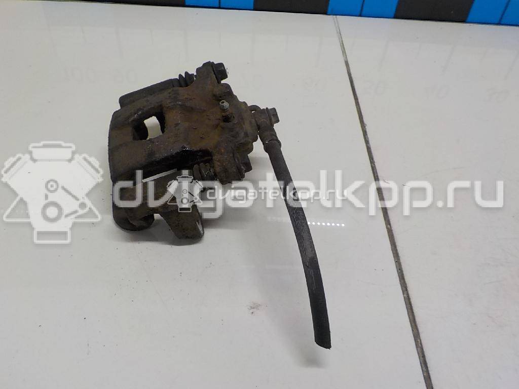 Фото Суппорт тормозной задний правый  44001EM11A для Nissan Tiida / Qashqai / Cube Z12 / Juke F15 / Pulsar C13 {forloop.counter}}