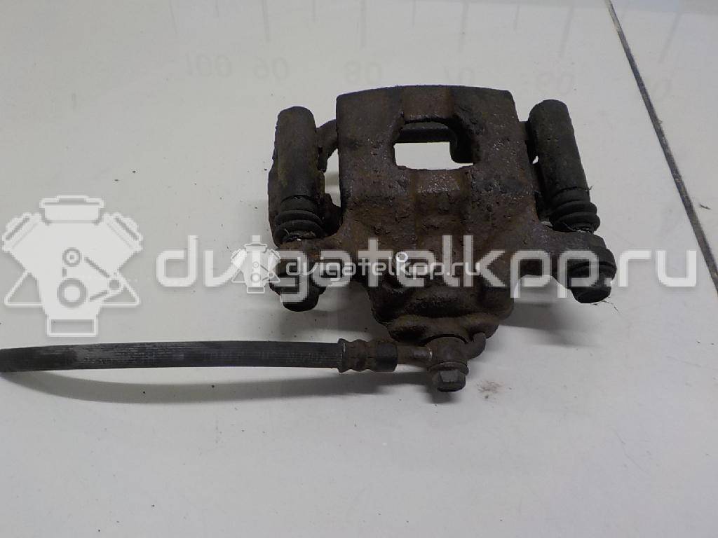 Фото Суппорт тормозной задний правый  44001EM11A для Nissan Tiida / Qashqai / Cube Z12 / Juke F15 / Pulsar C13 {forloop.counter}}