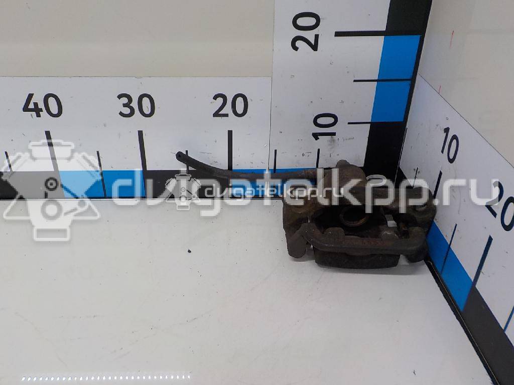 Фото Суппорт тормозной задний правый  44001EM11A для Nissan Tiida / Qashqai / Cube Z12 / Juke F15 / Pulsar C13 {forloop.counter}}