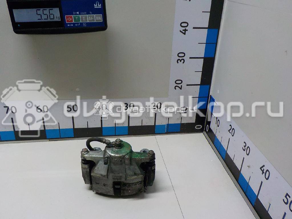 Фото Суппорт тормозной передний правый  410014EA0A для Nissan Qashqai {forloop.counter}}