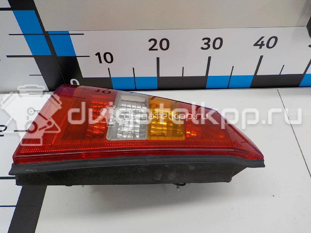 Фото Фонарь задний левый  6223023 для Opel Astra {forloop.counter}}