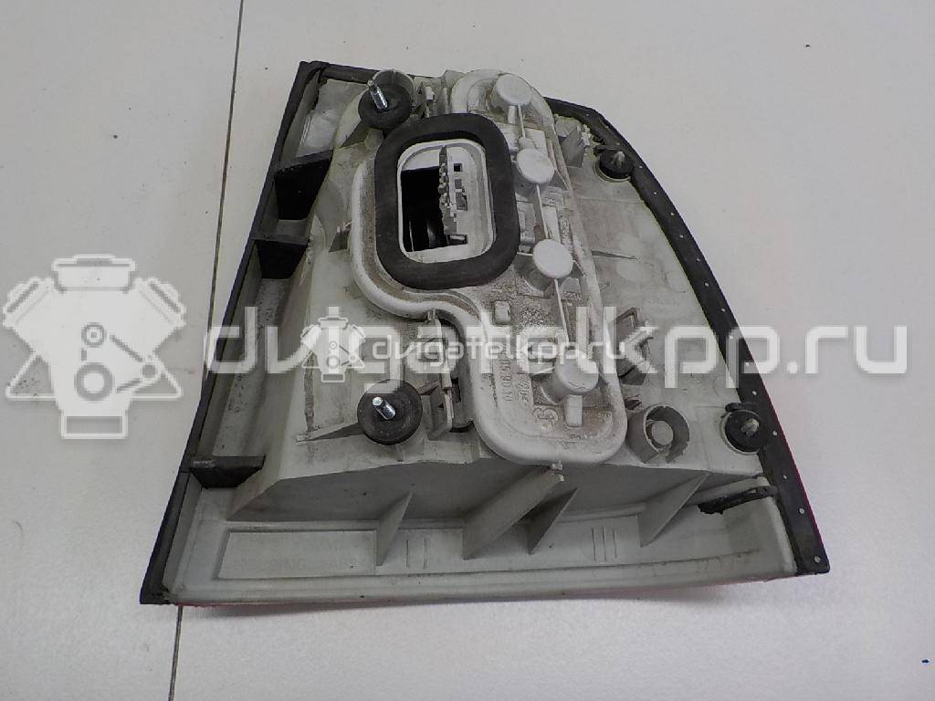 Фото Фонарь задний левый  6223023 для Opel Astra {forloop.counter}}