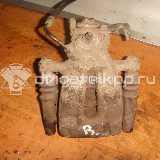 Фото Суппорт тормозной задний правый  7701208362 для Renault Modus Grand F Jp0 / Clio / Scénic / Megane