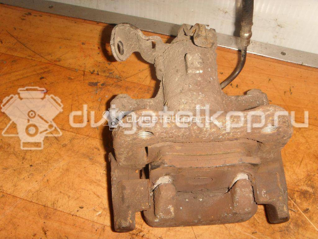 Фото Суппорт тормозной задний правый  7701208362 для Renault Modus Grand F Jp0 / Clio / Scénic / Megane {forloop.counter}}