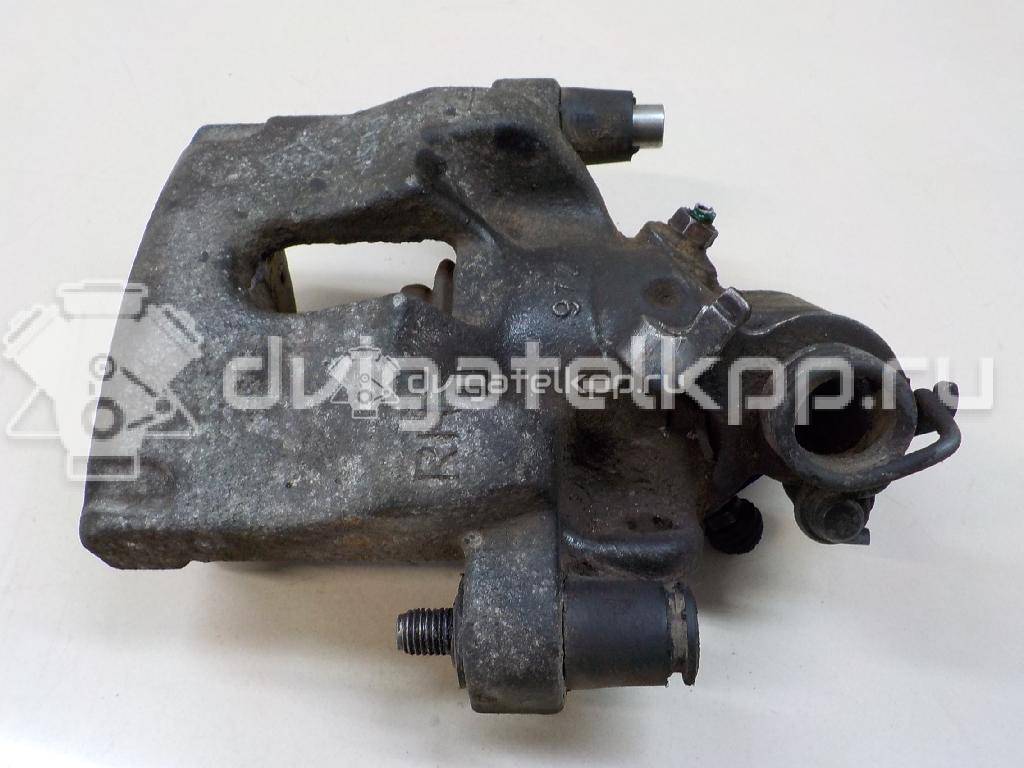 Фото Суппорт тормозной задний правый  440010014R для Renault Laguna {forloop.counter}}